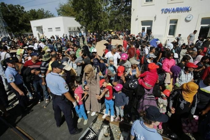 Refugees at a train station in Tovarnik Croatia