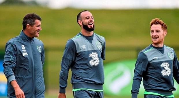 Republic of Ireland assistant manager Roy Keane with Marc Wilson and Stephen Quinn during squad training