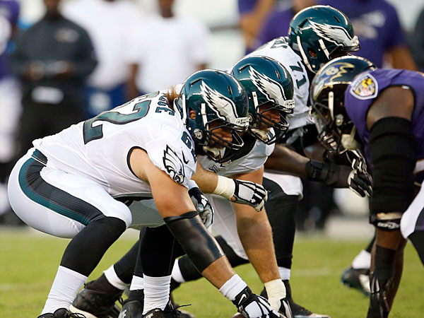 Jason Kelce prepares to snap the football against the Ravens