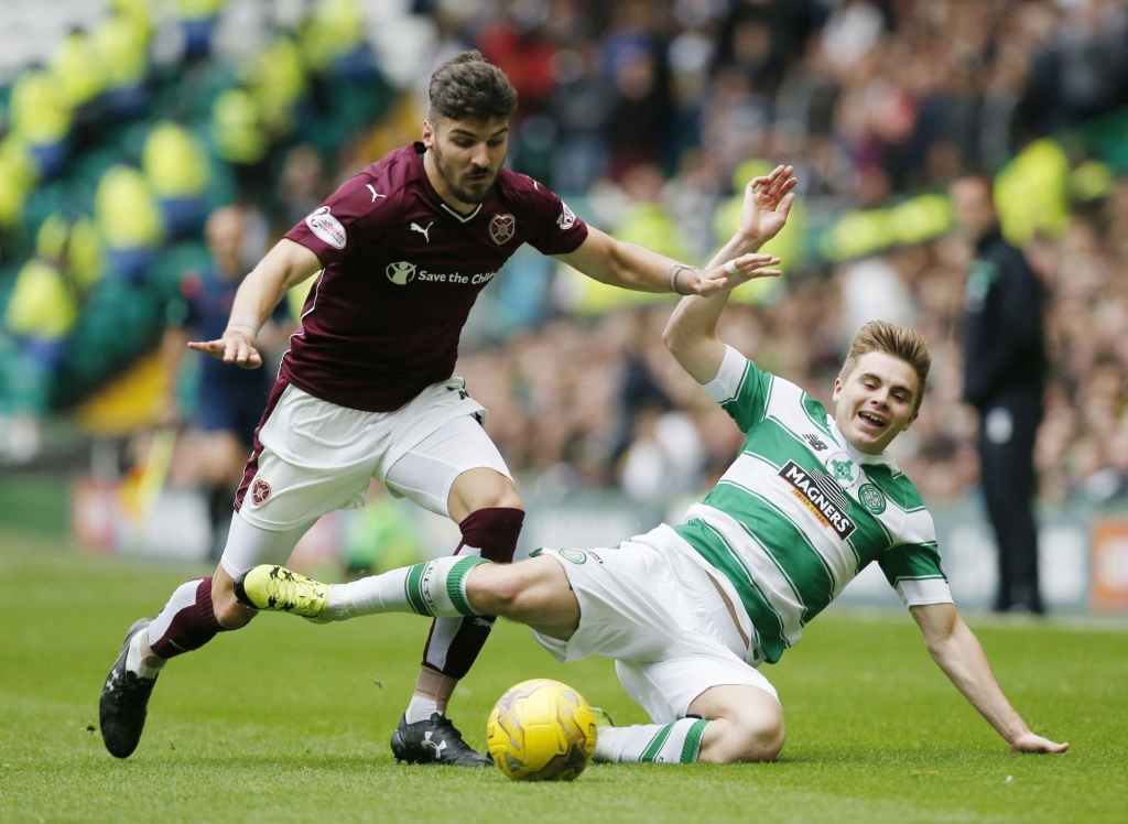 Heart of Midlothian's Callum Paterson and Celtic's James Forrest battle for the ball during the Ladbrokes Scottish Premiership match at Celtic Park Glasgow