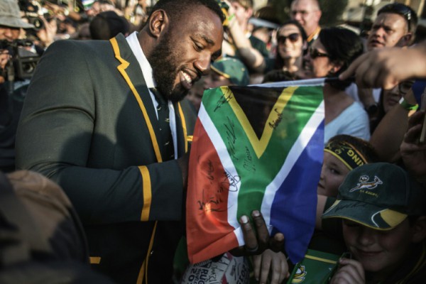 AFP  File  Gianluigi Guercia South African prop Tendai Mtawarira signs autographs during the official send-off for the World Cup in Johannesburg