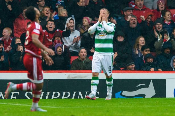 Dons fans give Celtic's Leigh Griffiths pelters after he misses chance