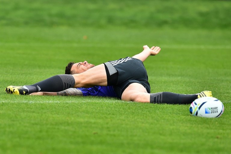 New Zealand All Blacks centre Sonny Bill Williams stretches during a training session at the Lensbury Hotel in Teddington