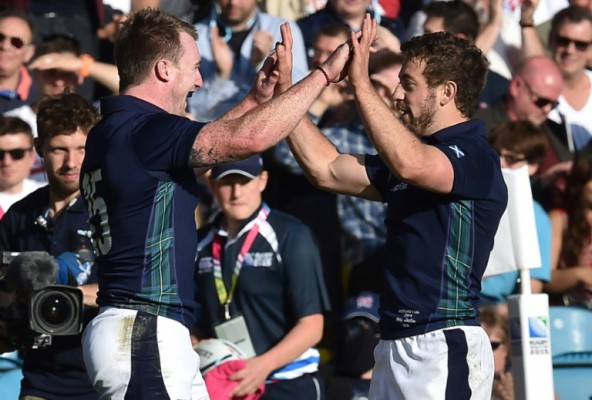 AFP  Paul EllisScotland's full-back Stuart Hogg and Scotland's scrum half Greig Laidlaw celebrate after winning a Pool B match of the 2015 Rugby World Cup between Scotland and USA