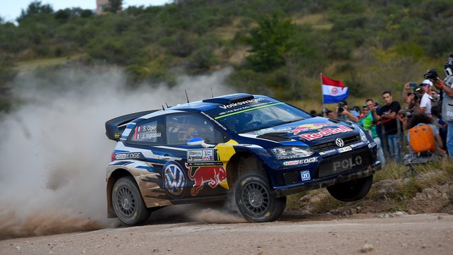 Sebastian Ogier flies in his Volkswagen Polo R en route to a third consecutive World Rally Championship title