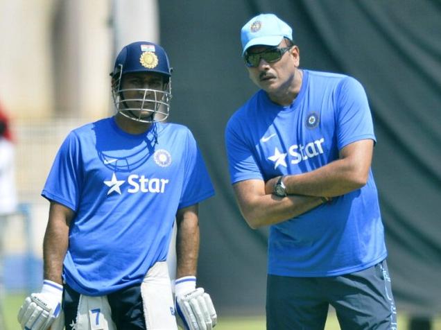 Indian ODI captain M.S. Dhoni with Team Director Ravi Shastri during a training camp in Bengaluru on Friday