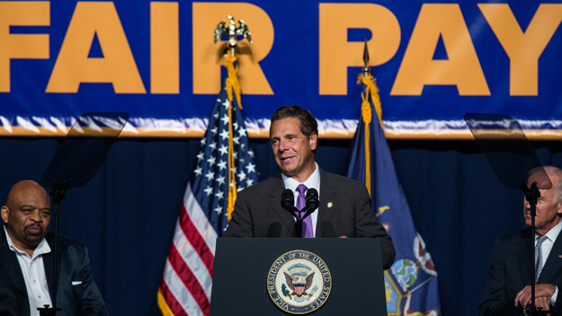 New York Gov. Andrew Cuomo announces his support to raise the minimum wage for the state of New York to $15 per hour on Sept. 10 2015 at the Javits Center in Manhattan