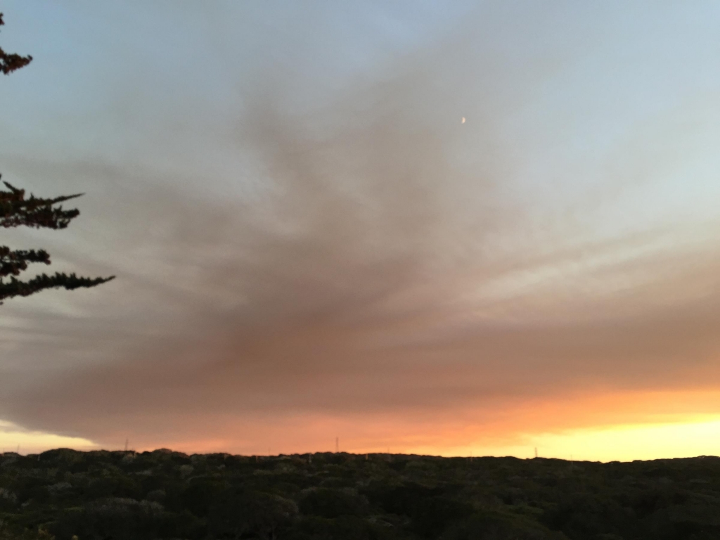 Smoke rises over the Monterey area as two fires burn Saturday evening