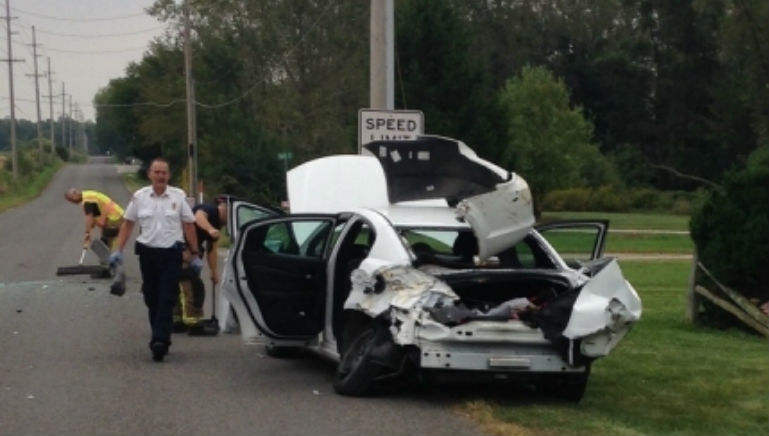 A woman jumped from a moving car when she saw a spider