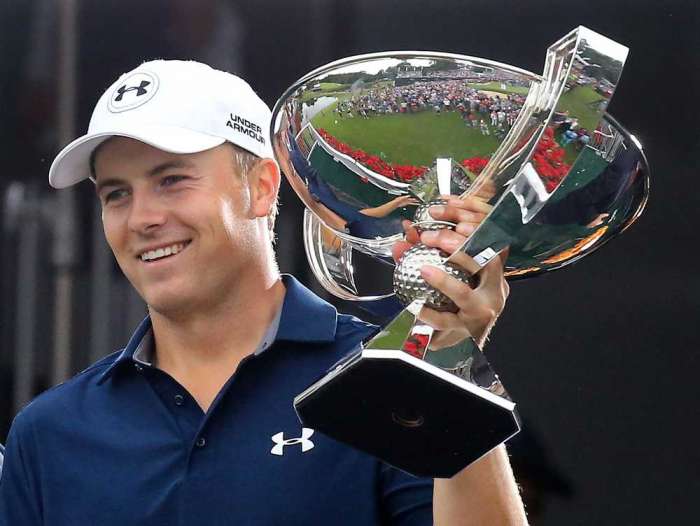 Jordan Spieth is presented the Fed Ex Cup after winning the Tour Championship on Sunday Sept. 27 2015 at East Lake Golf Club in Atlanta.  TNS