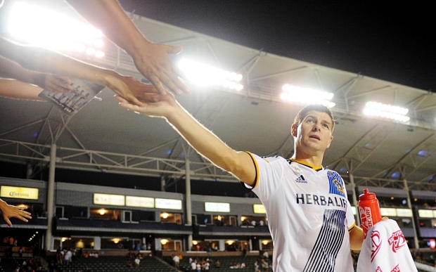 Steven Gerrard celebrates with fans at the Stub Hub Center in LA