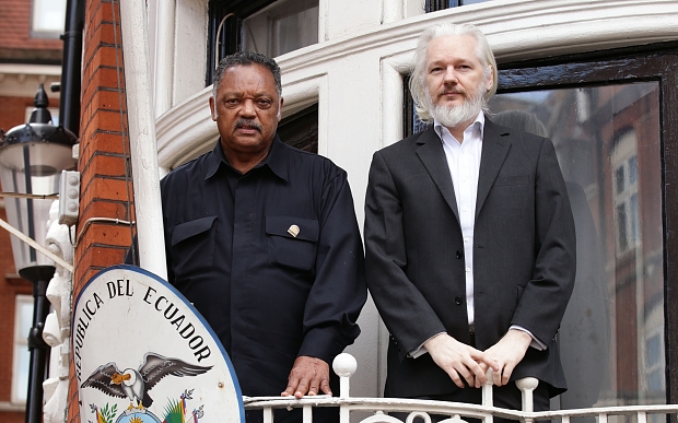 WikiLeaks founder Julian Assange with Reverend Jesse Jackson outside the Embassy of Ecuador in London