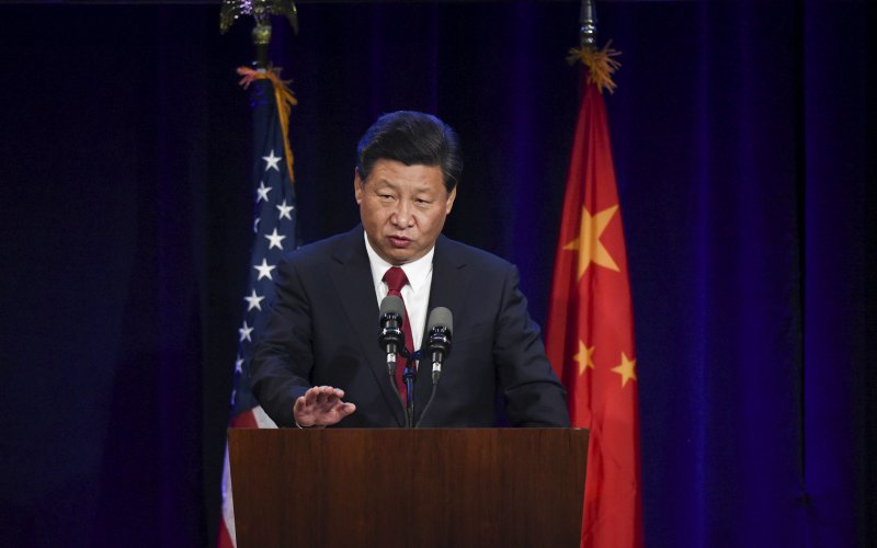 Chinese President Xi Jinping delivers a policy speech to Chinese and United States CEOs during a dinner reception in Seattle Washingt