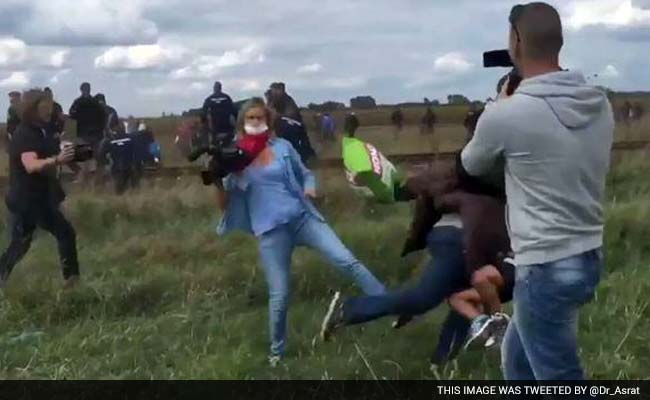 Hungarian TV Camerawoman Fired for Kicking Fleeing Migrants