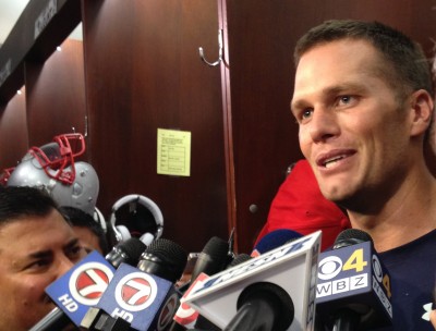 Tom Brady speaks Wednesday in front of his locker at Gillette Stadium