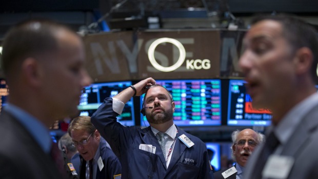 Traders on the floor of the New York Stock Exchange Does the Fed know something we don't