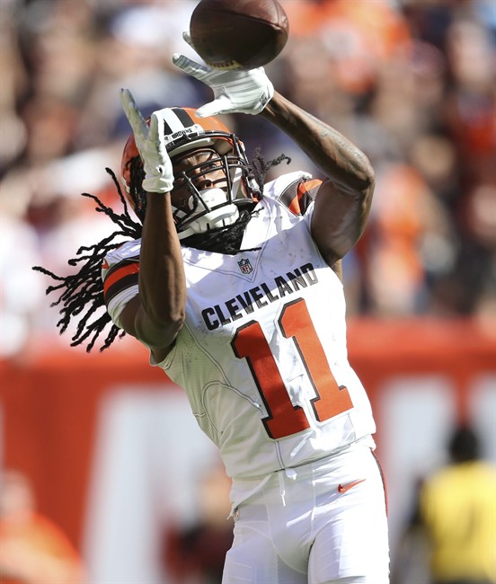 Cleveland Browns wide receiver Travis Benjamin catches a 50-yard touchdown pass from quarterback Johnny Manziel in the second half of an NFL football game against the Tennessee Titans Sunday Sept. 20 2015 in Cleveland