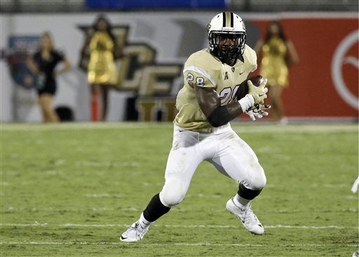 Central Florida's William Stanback carries the ball against Florida International during the second half of an NCAA college football game in Orlando Fla. UCF has dismissed the junior running back from the