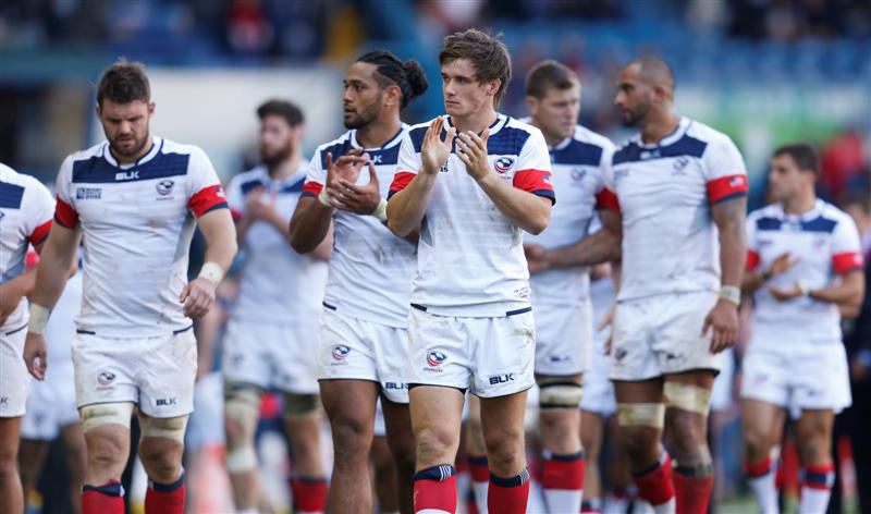 USA players applaud the crowd after their loss to Scotland