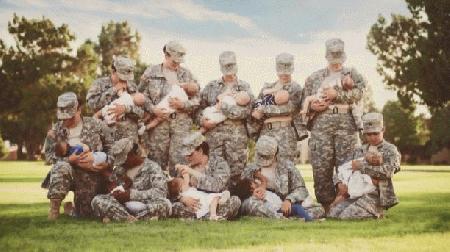 Military moms pose while breastfeeding their babies story image