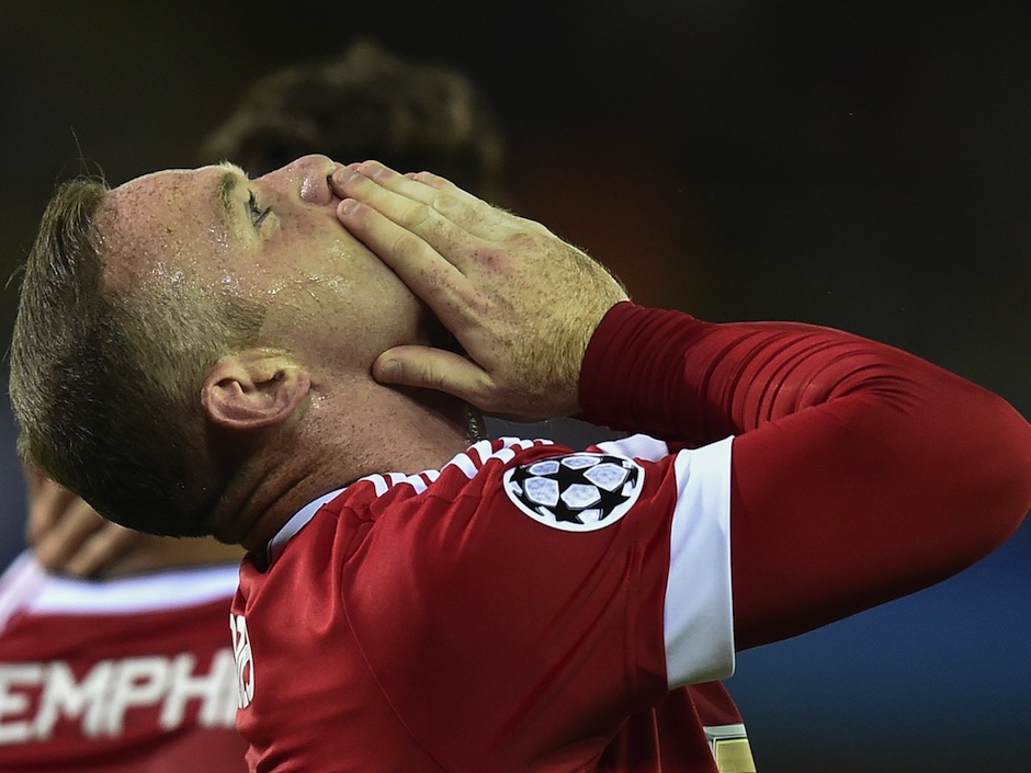 Manchester's Wayne Rooney celebrates after scoring the opening goal against Brugge in Belgium on Wednesday