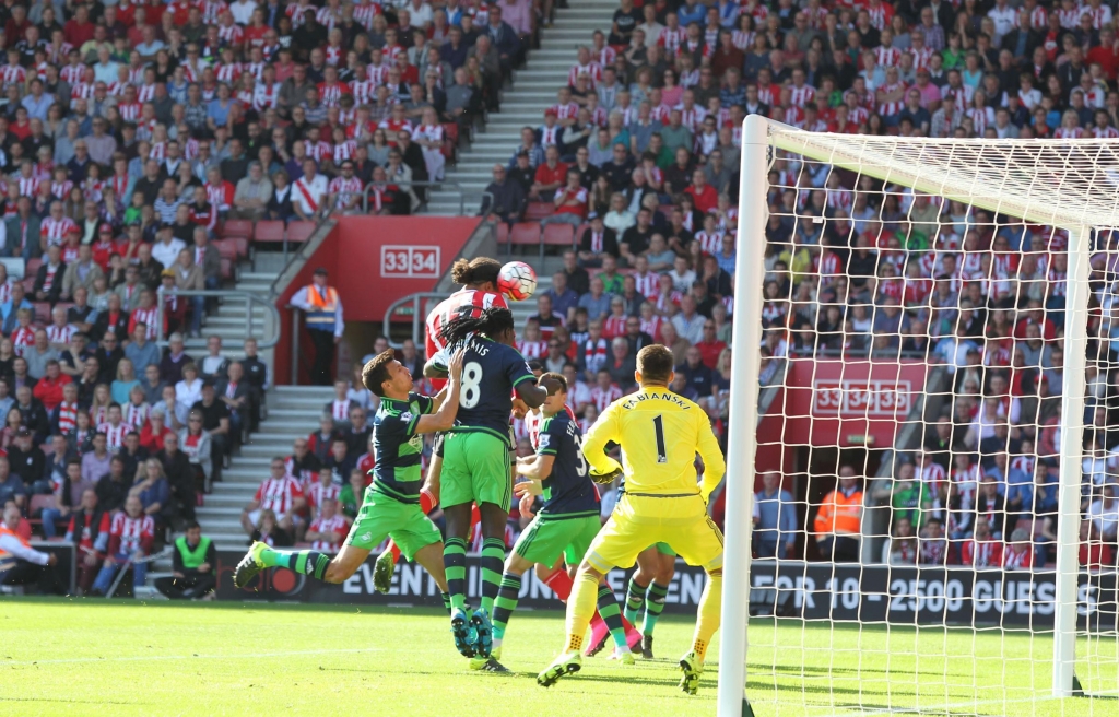 Vigil van Dijk jumps highest to score in the 3-1 win over Swansea