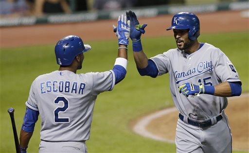 Kansas City Royals Alex Rios is congratulated by Alcides Escobar after Rios hit a solo home run off Cleveland Indians starting pitcher Josh Tomlin during the fifth inning of a baseball game Tuesday Sept. 15 2015 in Cleveland. (AP