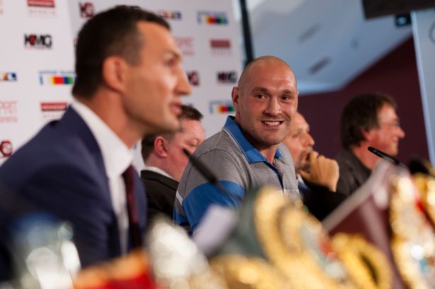 WBO WBA IBF and IBO heavyweight champion Wladimir Klitschko with Tyson Fury