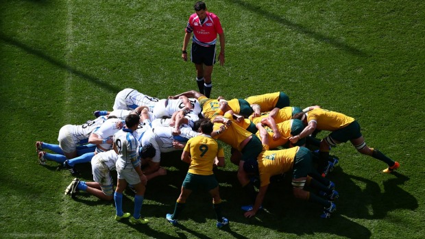 Wallaby Nick Phipps prepares to put the ball into the scrum during the pool A match between Australia and Uruguay in Birmingham on Sunday