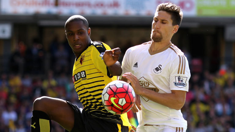 Watford's Odion Ighalo and Federico Fernandez of Swansea clash in a game Monk says was his side's only bad performance this season