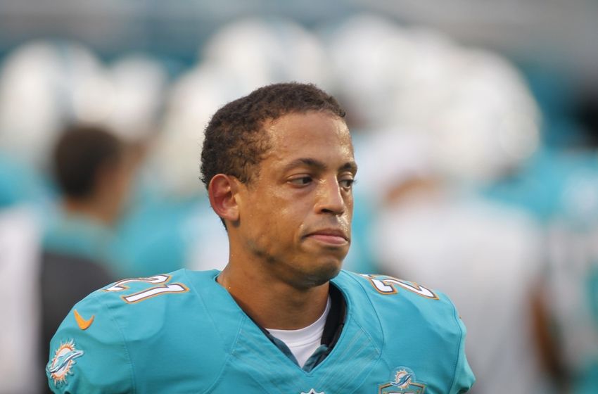 Miko Grimes tackled by cop arrested before Dolphins game