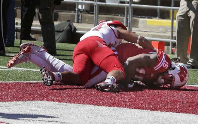 Wisconsin wide receiver Robert Wheelwright scores a touchdown in the first half Saturday against Miami