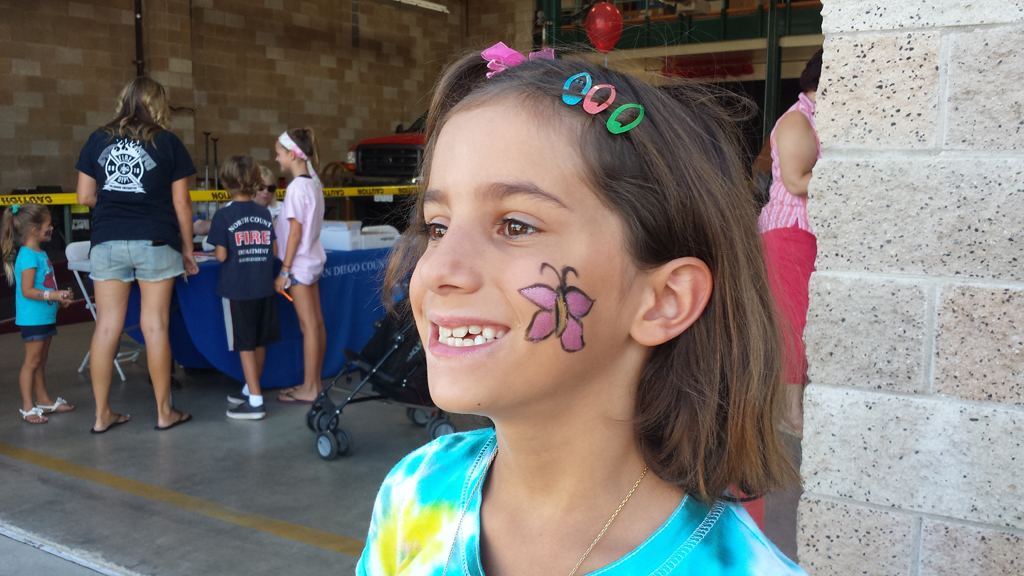 Youth have an opportunity to get their faces painted with artistic designs at the North County Fire Open House on October 10