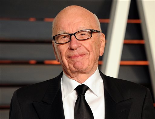 Rupert Murdoch arrives at the 2015 Vanity Fair Oscar Party in Beverly Hills Calif. Murdoch issued an apology Thursday Oct. 8 after he faced social media backlash following his suggestion that President Barack O