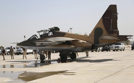 A Russian Sukhoi Su-25 fighter plane arrives at Iraq's al Muthanna military airbase at Baghdad airport in Baghdad