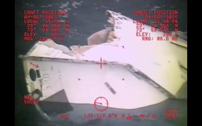 A heavily damaged life boat from the cargo ship El Faro is seen in video released by the US Coast Guard