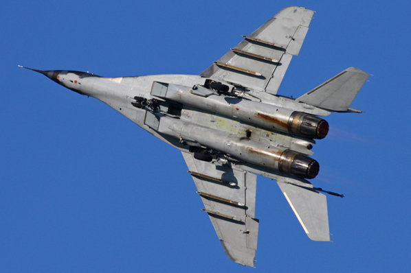 Mig-29 fighter jet in the blue sky