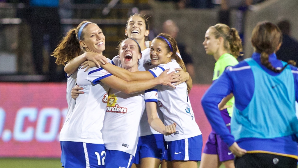 FC Kansas City celebrate after winning the NWSL soccer championship match in Portland Ore. Thursday Oct. 1 2015. FC Kansas City won the match 1-0