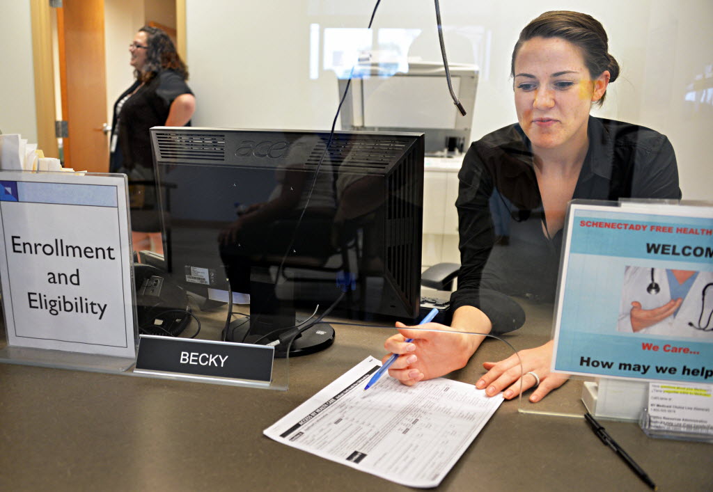 Eligibility and Enrollment coordinator Becky Staryk signs people up for insurance at Hometown Health in Schenectady in 2013