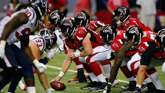 ATLANTA GA- OCTOBER 04 Sean Renfree #12 of the Atlanta Falcons lines up the offence in the second half against the Houston Texans at the Georgia Dome