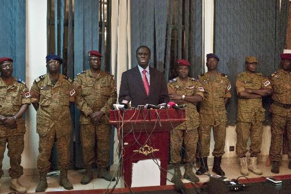 Burkinabe President Michel Kafando speaks at a news conference after soldiers took control of the Naaba Koom military camp in Ouagadougou Burkina Faso