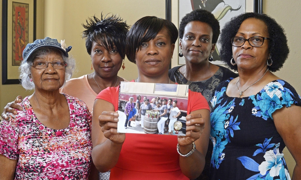 Five members of the Sistahs on the Reading Edge book club from left Katherine Neal Georgia Lewis Lisa Renee Johnson Allisa Carr and Sandra Jamerson