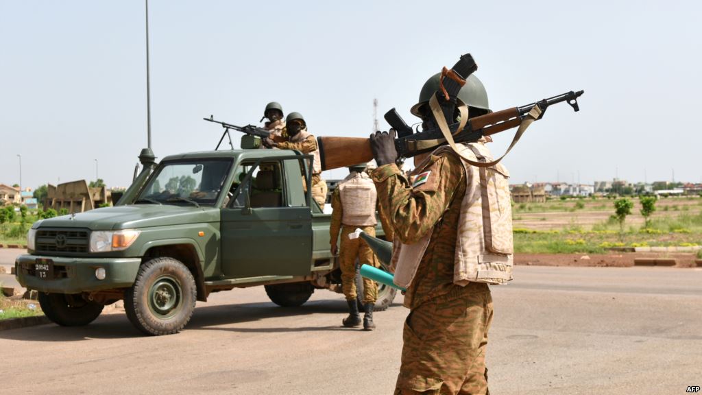 Burkinabe soldiers patrol near to the Presidental Security Regiment military barracks in Ouagadougou Sept. 29 2015