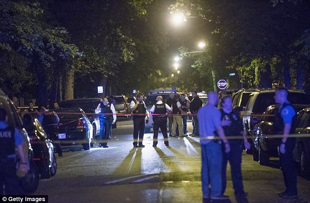 A mother and a grandmother have been killed and three others including an 11-month-old baby injured in a drive-by shooting in Chicago