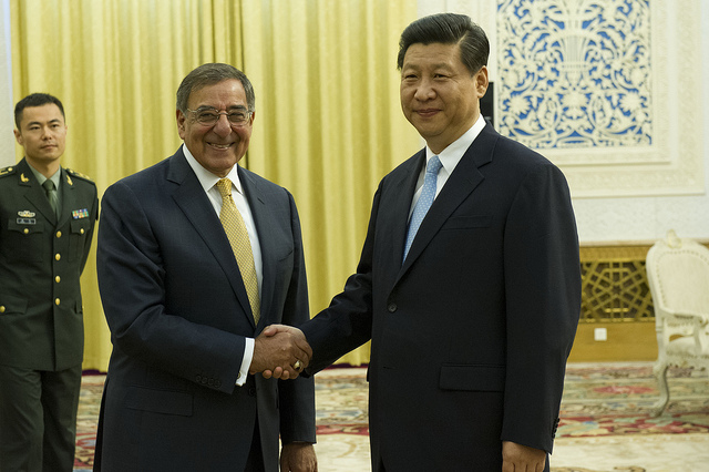 Chinese President Xi Jinping poses with then Secretary of Defense Leon E. Panetta in 2012