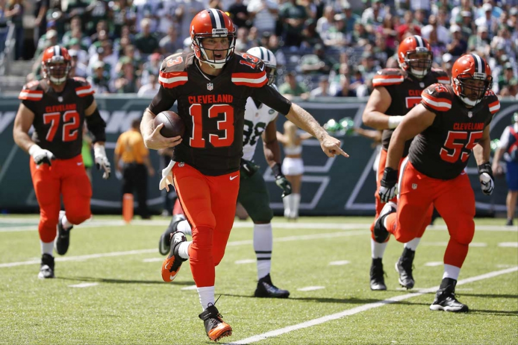 Cleveland Browns quarterback Josh Mc Cown scrambles out of the pocket during the first half of an NFL football game against the New York Jets Sunday Sept. 13 2015 in East Rutherford New Jersey