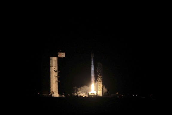 A United Launch Alliance Atlas V rocket lifts off from California's Vandenberg Air Force Base carrying the classified NROL-55 satellite for the U.S. National Reconnaissance Office as well as 13 tiny cubesats for the NRO and NASA during a pre-dawn