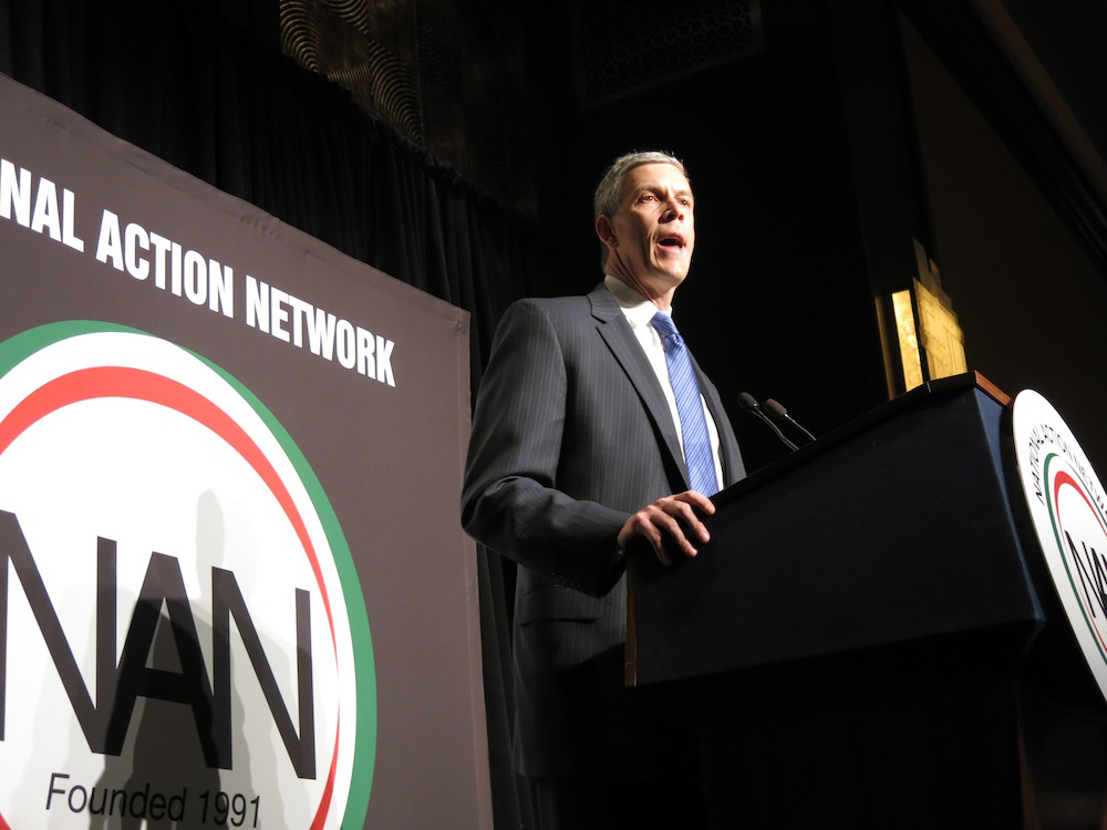 Arne Duncan speaking at Al Sharpton's National Action Network conference in 2014