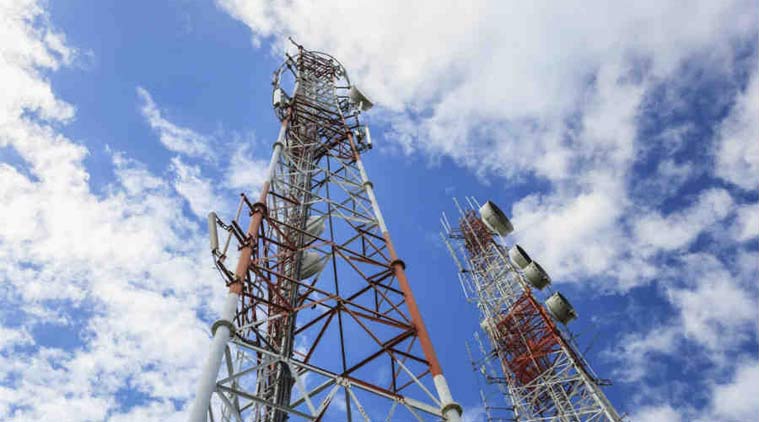 DoT disconnects telecom  majors' call on spectrum - Business Standard