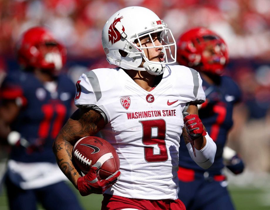 Washington State wide receiver Gabe Marks scores a touchdown against Arizona during the first half of an NCAA college football game Saturday Oct. 24 2015 in Tucson Ariz